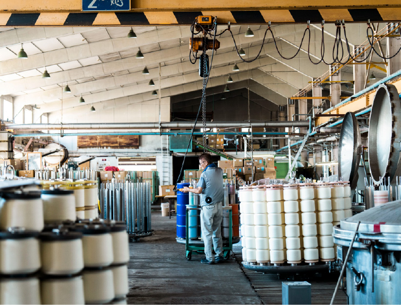 共同精練染色工業（株）